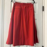 Athleta  Savannah Travel Activewear Midi Skirt Orange Red Size Medium Photo 5