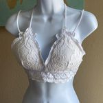Cherish Large white lacy strappy bralette stretchy lined  smocked criss cross Photo 0