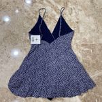 SEEK the Label . Navy blue floral romper. Size small. NWT Photo 5
