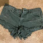 Impressions Green Denim Cut Off Shorts  Photo 0