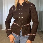 Brown and pink button Photo 1