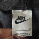 Nike  Women's Classic Black Flare Pants Photo 3