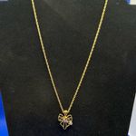 Nina Ricci gold and crystal bow necklace Photo 1