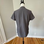 FIGS gray technical collection scrub top in a size small Photo 1