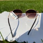 Jessica Simpson , dark brown sunglasses Photo 3