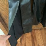 Pretty Little Thing  black strappy split hem flare jumpsuit‎ Photo 2