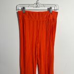 Free People Movement Pant Women S Orange Crinkle Pullon Flair Boho Athleisure Photo 1