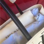 Kate Spade Authentic thick canvas/leather floral snap sides large Tote Photo 9