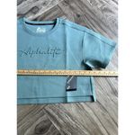 Alphalete NEW  Woman’s  ELMTS Short SLEEVE Crop - Teal , Size Medium Photo 2