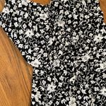 Tropical Escape Black And White Floral Ruched One Piece Swimsuit Photo 1