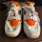 Nike  Air Huarache sneakers in the "White Safety Orange" colorway Photo 0