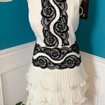 BCBGMAXAZRIA Women’s BCBG Maxazaria white sleeveless dress with black lace Size 6 Photo 0