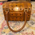 MCM  Tan Leather Satchel with Gold Accents Photo 0