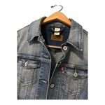 Levi's  Classic Trucker Denim‎ Jean Jacket
- Women's S-P- Medium Wash
Buttoned Photo 1