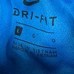 Nike  women’s Dri Fit running lined short size large Photo 5