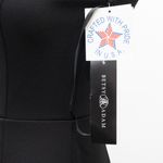 Betsy and Adam . Arielle Scuba Crepe Ruffle Slit Gown. Photo 7