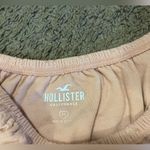 Hollister light pink floral off the shoulder cropped size medium shirt Photo 6