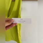 Live in the Moment  Neon yellow stretch top size xs new with tags Photo 1