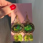 Hot Topic Dragon eye snake hello kitty Green Gold Dangle Earrings Photo 1
