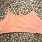 Lululemon  Neon Orange sports bra with mesh panel in back Size 12 no padding Photo 0