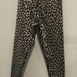 AQUA  black and gold animal print 7/8 leggings. Photo 4