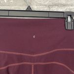 Athleta High Rise Peekaboo 7/8 Tight Burgundy Legging Photo 5
