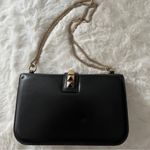 Valentino Garavani Valentino Rockstud Medium Glam Lock Flap Bag in Black Photo 2