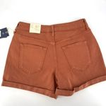 Universal Threads NWT Universal Thread Hi Rise Midi Smooth & Sculpts Shorts Size 6 4” burnt orange Photo 1