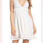 Ali & Jay  Kiss Me in the Candlelight Crochet Tassel Mini Dress in White Photo 1