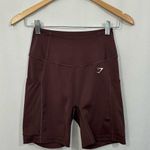 Gymshark  High Rise Side Pocket Bike Shorts in Plum Photo 0