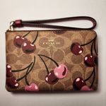 Coach  CORNER ZIP WRISTLET IN SIGNATURE CANVAS WITH CHERRY PRINT CZ450 Photo 2