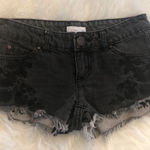 O'Neill O’Neill black embroidered‎ flower cutoff shorts Photo 0