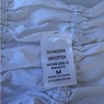 Olivaceous  White Tie Front Crop Top Photo 3