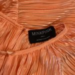 MINKPINK Revolve  Livia Plisse short sleeve Flowy Orange Pleated Romper small Photo 2