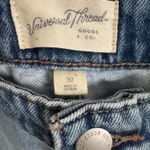 Universal Threads Women's Mid-Rise 90's Baggy Denim Jeans - Universal Thread™ Size 30 (4-5X) NWT The Women's Mid-Rise 90's Baggy Denim Jeans by Universal Thread in size 30 (4-5X) offers a comfortable and stylish fit for plus-size women. These straight-leg jeans in a classic blue denim color are perfect for those looking for a retro-inspired look with a modern twist. The baggy fit and mid-rise waist give a relaxed and effortless feel, while the denim fabric ensures durability and timeless style. Perfect for achieving that classic 90's vibe in any outfit. Photo 6