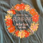 Alpha phi T Photo 3