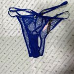Victoria's Secret Victoria’s Secret Fishnet String Cheeky Panty and Garter Photo 6