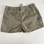 Women's Olive Cargo Shorts. Drawstring with button and zipper. Inseam 4” Size 4 Green Photo 3