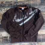 Nike brown zip up jacket size large Photo 0
