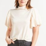 Free People Claudia T-Shirt Velvet Puff Sleeve
Mock Neck Blush Pink medium Photo 0