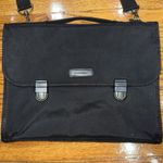 Brookstone black neoprene waterproof lap top bag with detachable shoulder strap. Photo 1
