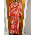 Free People  First Kiss Boho Flowy Maxi Dress in Orange and White Floral Print Photo 1