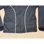 Under Armour women’s medium black/white jacket Photo 4