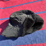 UGG  Australia black quilted bucket like fur lined hat Photo 1