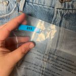 Good American Woman Size 6 light wash denim mini skirt Photo 6