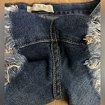 We The Free Women’s Distressed Button fly Raw Hem
Exposed Pockets Denim Shorts Photo 7