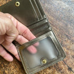 Fossil  Black cow hide leather wallet with gold leather lining Photo 9