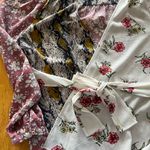 Gimmicks by BKE Gimmicks Floral and Snake Print Wrap Top Photo 4