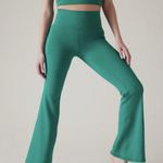 Athleta  Salutation Stash Flare Pants Emerald Green Photo 0