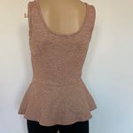 Sleeveless Peplum Tank Top Photo 1